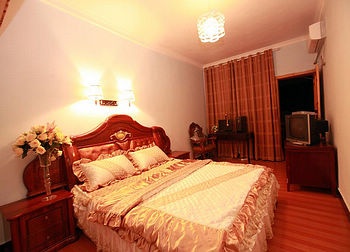 -- - Fenghuang fishing village bird's nest  business hotel