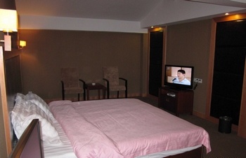 Guest Room - Yangyang Holiday ＆#8226; Jiulongh Lake Health Care Hotel - Ningbo