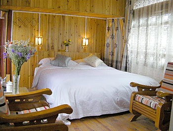 Deluxe Sunshine King Room - Taxiang Gushi Inn - Lijiang