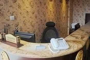 Reception Desk - Liquan Bozuan Hotel - Lijiang