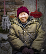 Old woman in Guilin lane way