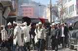 carrying the coffin 